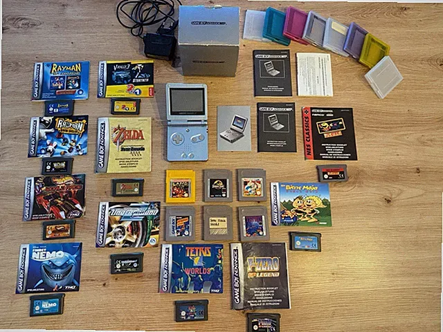 Nintendo Gameboy Advance SP Konvolut Mit OvP Spiele Zelda Mario Tetris Usw.