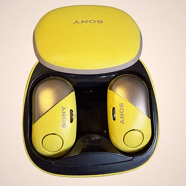 Sony Sportkopfhörer WF-SP700N mit Noise Cancelling Gelb / Ladecase Defekt